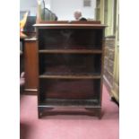 An Early XX Century Mahogany Bookcase, with a low back moulded edge, two adjustable shelves on