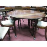 A Mid XVIII Century Mahogany Table, with drop leaves, on pad feet.