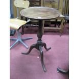 A Late XVIII Mahogany Pedestal Table, with a circular dish top, turned pedestal on cabriole legs,