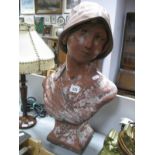 A Large Terracotta Bust of A French Lady Wearing Hat, (Art Nouveau style) stamped "France 65" to