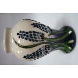 A Moorcroft Pottery Vase, decorated in the Muscari pattern by Elise Adams, shape 46/4, impressed and