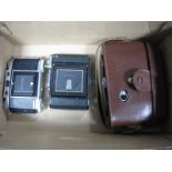 Three Zeiss Ikon Folding Cameras, including a Nettar 517/2, Contina and Ikonta. (3)