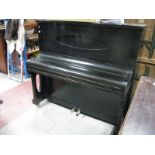 An Early XX Century Paul Winkler of Munich overstrung ebonised upright piano.