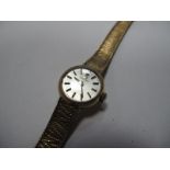 Omega; A 9ct Gold Cased Ladies Wristwatch, the signed dial with baton markers, to integral