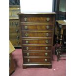 A Mahogany Music Cabinet, with a moulded edge, seven drawers, with fall front, on bracket feet,