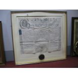 A George III Indenture with Attached Seal, in tin 10.5cm, mounted, glazed and framed.
