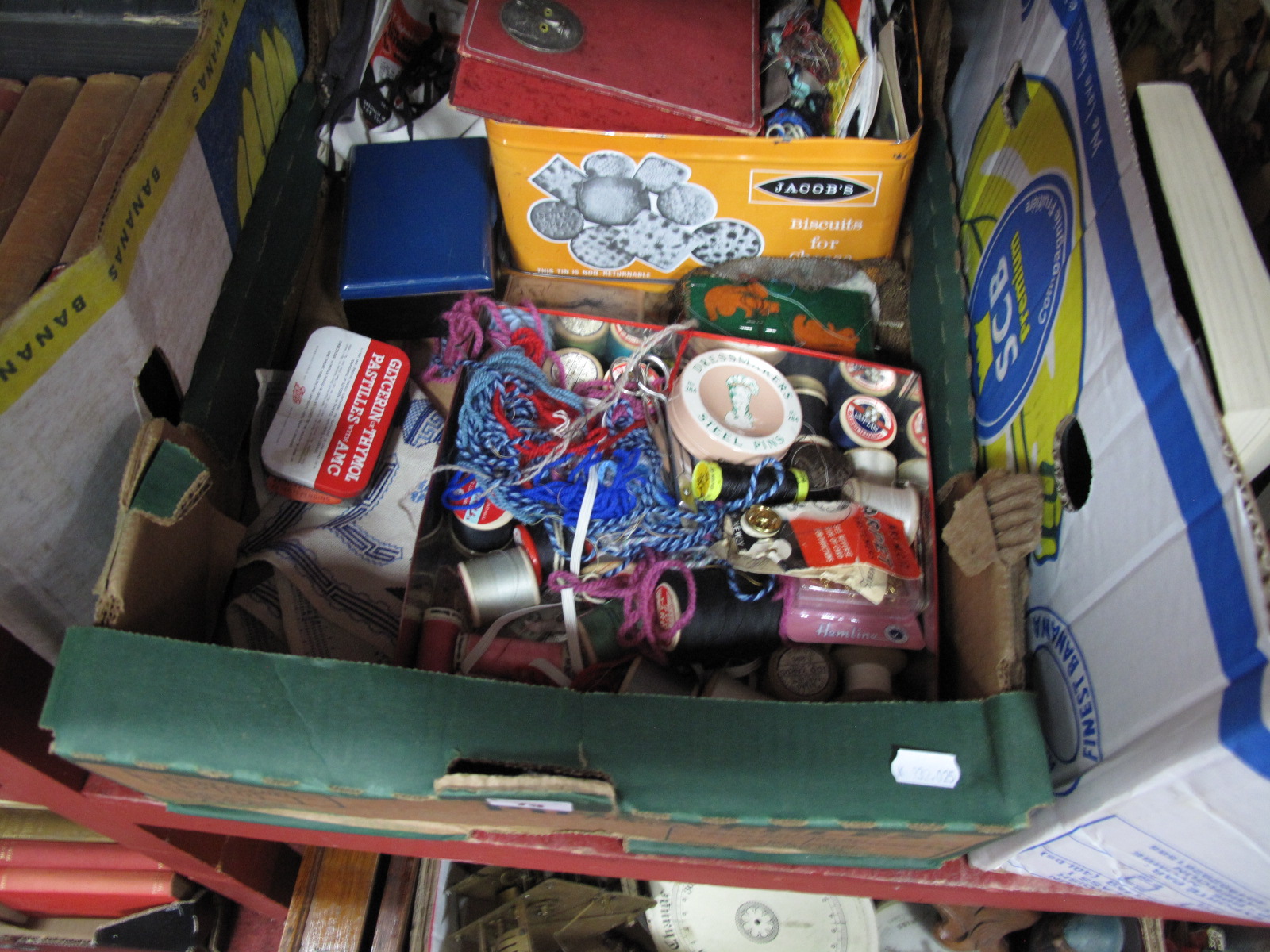 A Quantity of Sewing Items, cottons, scissors, needles, etc:- One Box