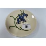 A Moorcroft Pottery Coaster, decorated in the Bluebell Harmony design by Kerry Goodwin, shape 780/4,