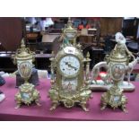 A Mid to Late XX Century Brass Three Piece Clock Garniture, the timepiece having eight day movement,