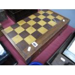A XX Century Mahogany Folding Chess and Backgammon Board.