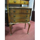 Serpentine Fronted Small Chest of Three Drawers, with side flaps, on cabriole legs.