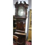A Mid XIX Century Mahogany Long Case Clock, broken swan neck pediment, arched door flanked by ring