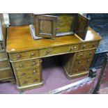 A XIX Century Mahogany Twin Pedestal Desk, with a polished top, central drawers, twin pedestals with