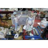 Lladro Pottery 'Wednesdays Child' and 'Thursdays Child' figurines with single box.