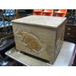 A XX Century Hardwood Storage Box, carved relief decoration of horses, dragons, elephant and