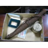 A Circa 1900 'Tobacco Prick', length 42cm; an unopened tin of Players Navy Cut Medium Cigarettes (