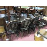 A Set of Four Wheel Back Dining Chairs, and draw leaf table.