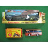 A Matchbox Battle Kings NO. K106 Tank Transporter, boxed. A Moto Guzzi by Talespin, boxed and a Hong