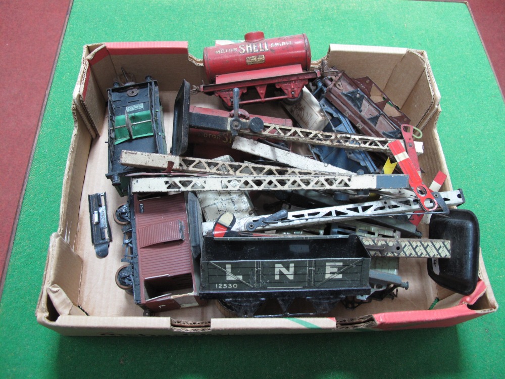 A Quantity of Mid XX Century Playworn "0" Gauge Rolling Stock and Signals.