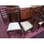 A Set of Four Edwardian Mahogany Dining Chairs, top rail with batwing inlay, pierced splat, drop