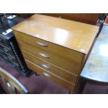 A 1970's Teak Four Heights Chest of Drawers, turned tapering legs.