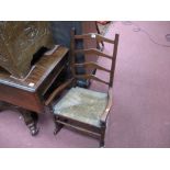 Late XIX Century Beech Ladder Back Rocking Chair, with rush seat.