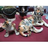 A Large USSR Pottery Recumbent Tiger, length 30cm and a related cub. (2)