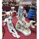 A Lladro Seated Dalmation Dog, D'art SA Figure Group. (2)