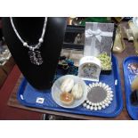 Necklaces, onyx eggs, Aynsley Wild Tudor mantel clock, etc:- One Tray