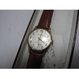 Garrard; A 9ct Gold Cased Gent's Wristwatch, the signed dial with Arabic numerals and seconds