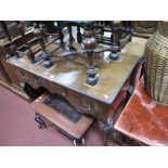 A XX Century Walnut Dressing Table, with crossbanded top, feather banding, three drawers, shaped