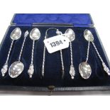 A Set of Six Hallmarked Silver Apostle Teaspoons, each with twisted stem, complete with matching