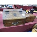 A George III Mahogany Tea Caddy, of sarcophagus form, boxwood stringing, raised on bun feet, and