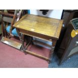 A Circa 1930's Oak Games Table, rectangular swivel baize lined fold over top with interior well,