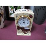 A Moorcroft Pottery Clock, decorated with the Chocolate Cosmos design by Rachel Bishop, shape CL1,