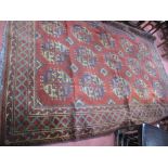 Persian Tasseled Wool Rug, with fifteen central octagonal motifs, geometric border on rust red