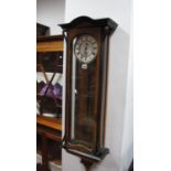 A Late XIX Century Walnut and Ebonised Cased Viennese Wall Clock, with Roman numerals to white