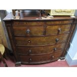 A XIX Century Mahogany Bow Fronted Chest of Drawers, two short drawers, three long drawers.
