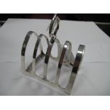 A Hallmarked Silver Five Bar Toast Rack, of arch design with angular loop handle, EV, Sheffield.