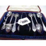 A Matched Set of Six Britannia Standard Silver Teaspoons, initialled with matching tongs, in a