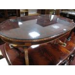 A Glass Oval Topped Mahogany Coffee Table, on twin tripod legs, nest of coffee tables. (2)