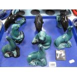 A Collection of Three Poole Pottery Small Dolphins, in turquoise and black glazes, two matching