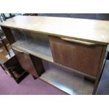 Teak Book Cabinet, with glass sliding doors, on tapering legs.