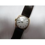 A 9ct Gold Cased Wristwatch, the white dial with black Roman numerals and seconds subsidiary dial,