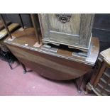 A Mid XVIII Century Mahogany Table, with drop leaves, on pad feet.