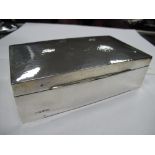 A Hallmarked Silver Cigarette Box, of plain rectangular form, with allover planished decoration,
