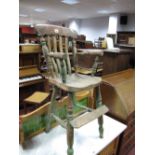 A XIX Century Ash and Elm Child's High Chair, with shaped top rail, turned arms and legs, foot