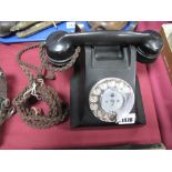 A 1950's Black Bakelite Telephone, type 332 F/F.W.R 55/2, with slide tray.