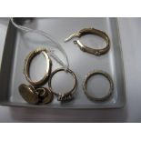 A Pair of 9ct Gold Hoop Earrings, an odd gent's cufflink, a three stone ring of crossover design and