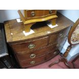 An Early XIX Century Mahogany Bow Fronted Chest of Drawers, with two short and two long drawers,